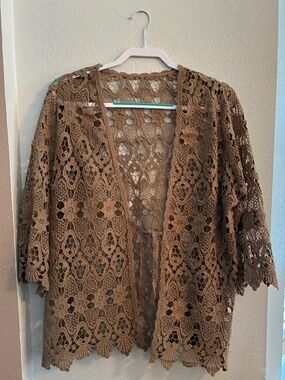 Tan lace tie from jacket